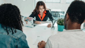 foster care case worker meeting with foster parents
